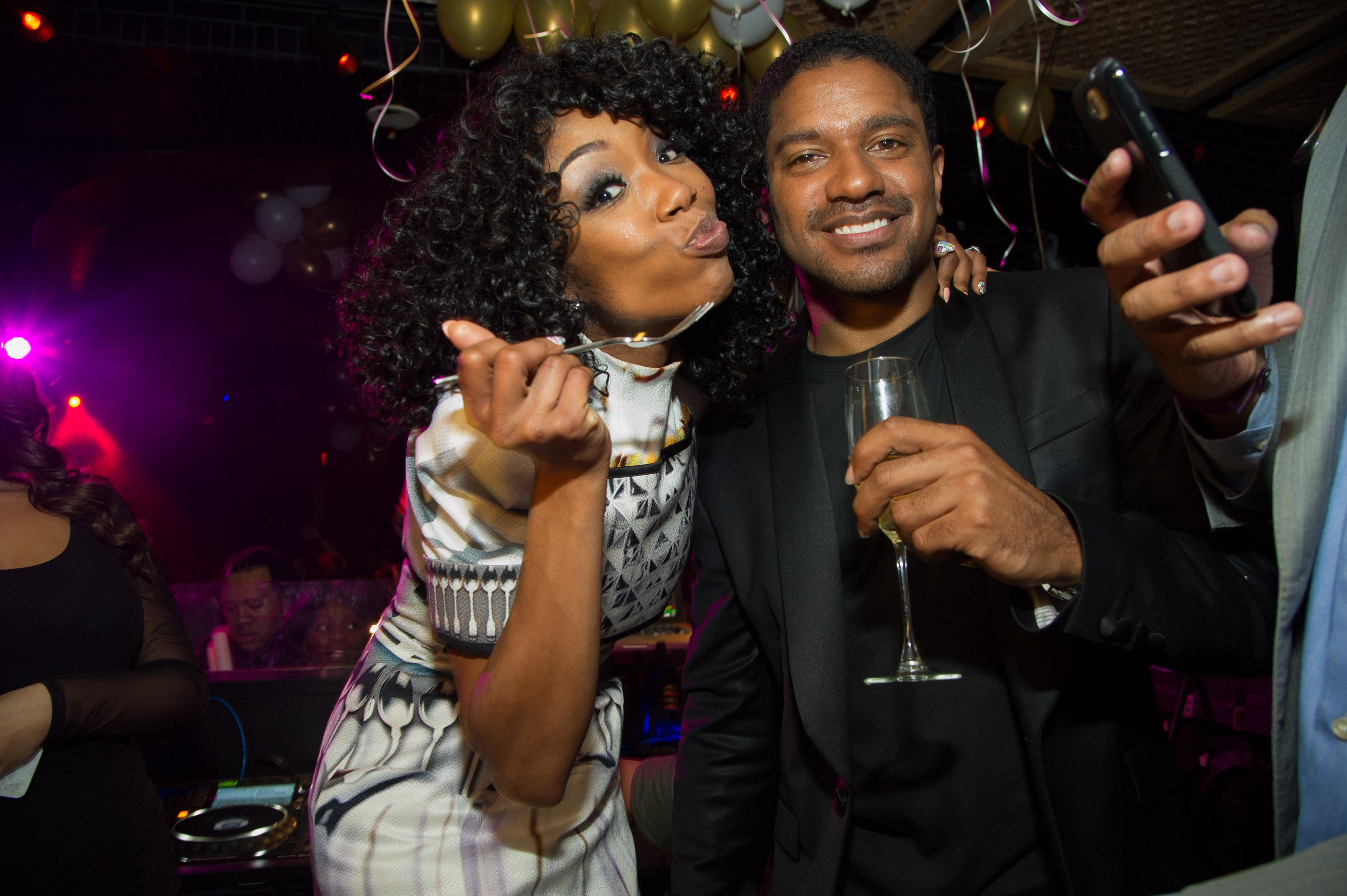 R&B singer, Brandy performs at Lavo Nightclub on New Years Eve with her fiance, Ryan Press in attendance on Monday, Dec. 31, 2012, in Las Vegas. (Photo by Al Powers/Powers Imagery/Invision/AP)