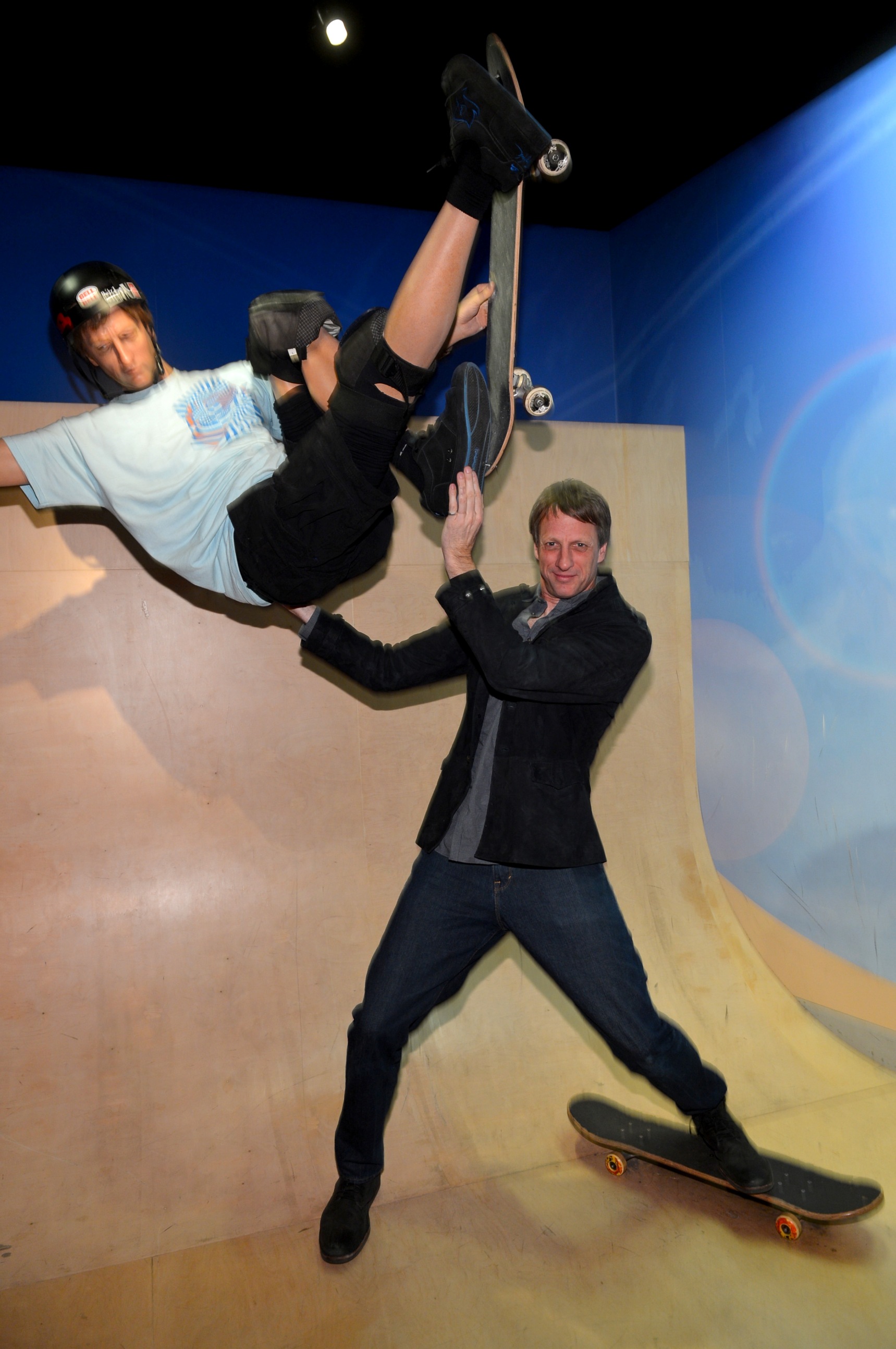 HOLLYWOOD, CA - JANUARY 23:  Professional skateboarder Tony Hawk poses next to a wax figure of himself as he attends Relativity Media's "Movie 43" Los Angeles Premiere held at the TCL Chinese Theatre on Januaprofessional skateboarderry 23, 2013 in Hollywood, California.  (Photo by Alberto E. Rodriguez/Getty Images For Relativity Media)