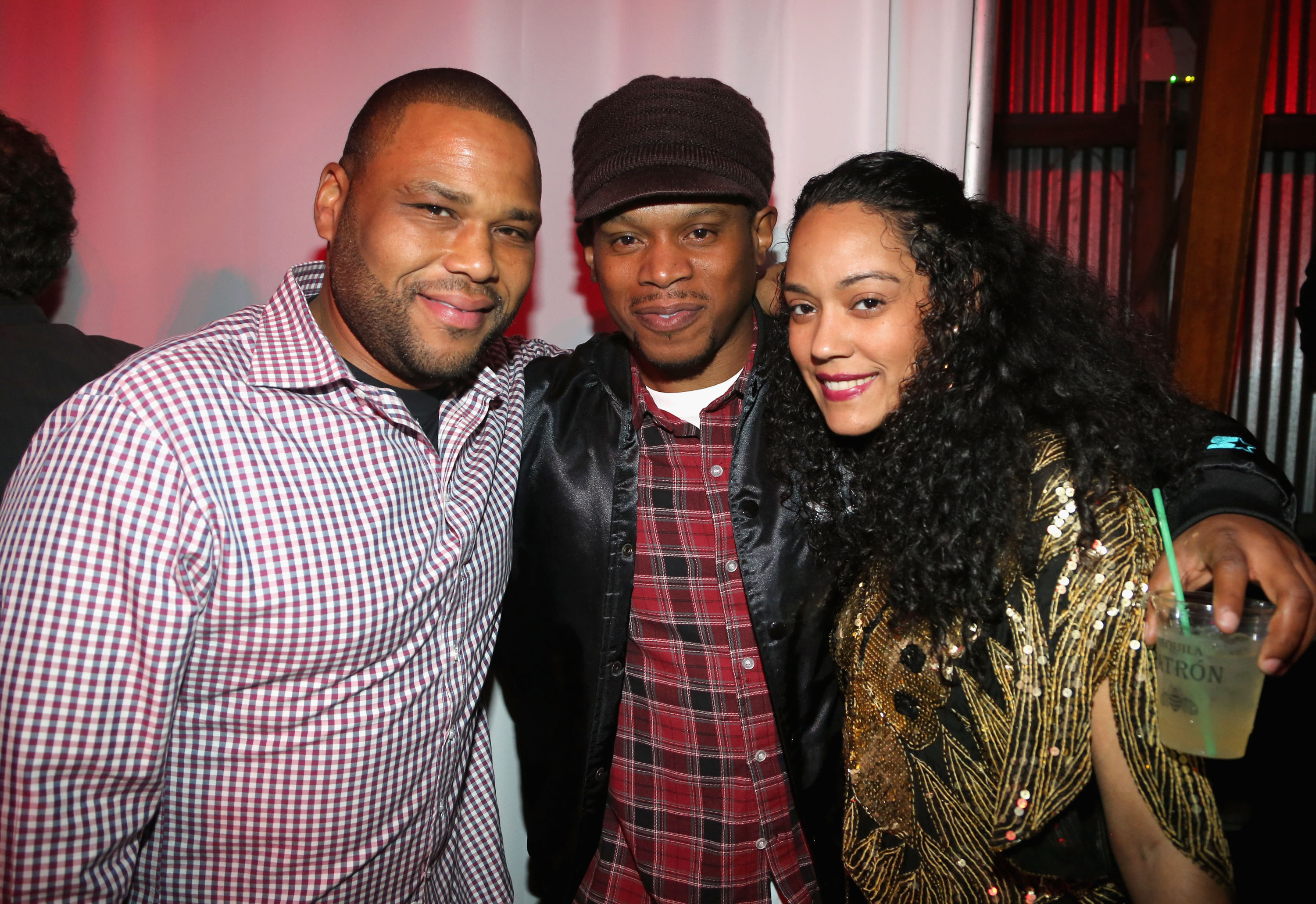 NEW ORLEANS, LA - FEBRUARY 02:  Actor Anthony Anderson, MTV's Sway Calloway and guest attend The Maxim Party With "Gears of War: Judgment" For XBOX 360, FOX Sports & Starter Presented by Patron Tequila at Second Line Warehouse on February 1, 2013 in New Orleans, Louisiana.  (Photo by Tasos Katopodis/Getty Images for Maxim)