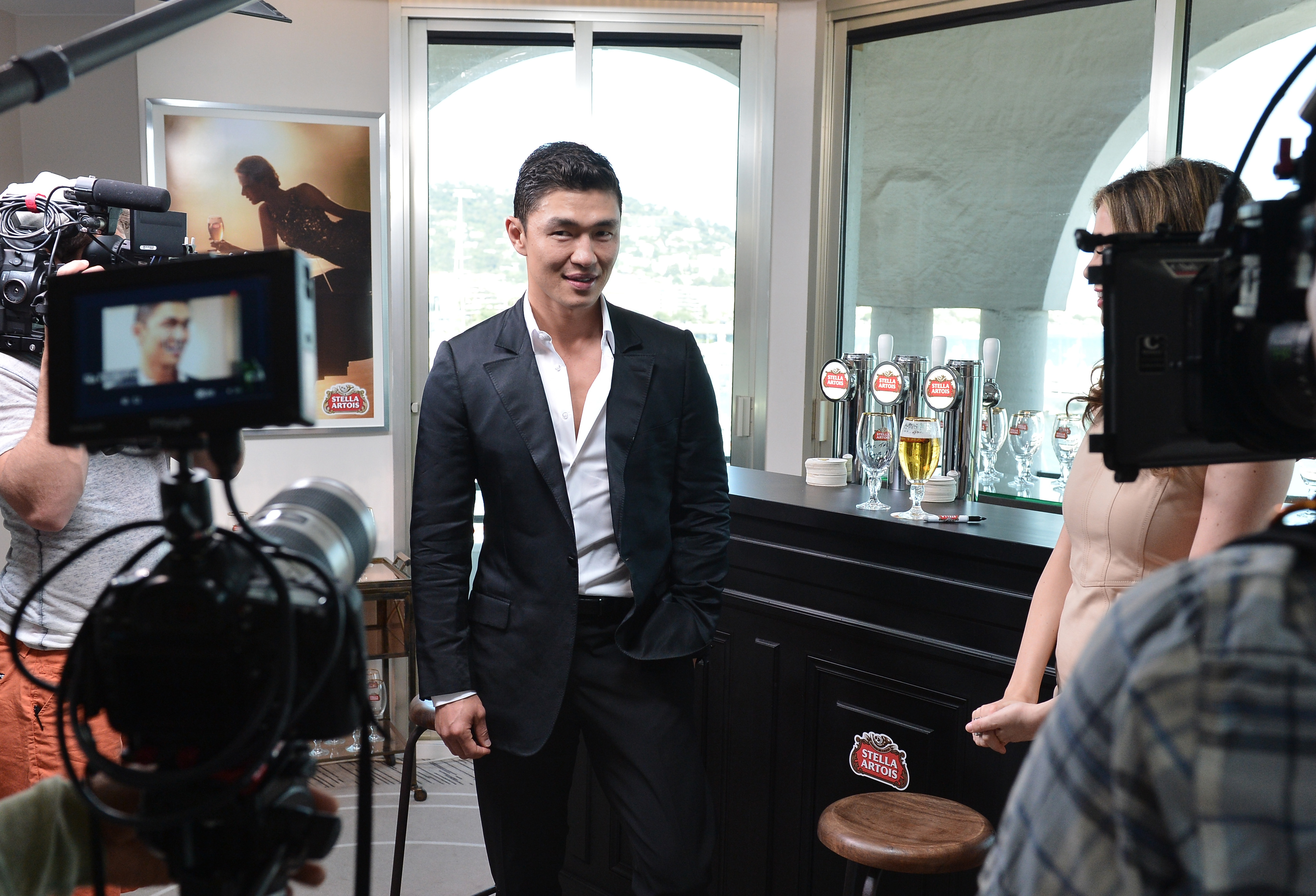 CANNES, FRANCE - MAY 20:  Rick Yune Visits Stella Artois Suite duing The 66th Annual Cannes Film Festival at Radisson Blu on May 20, 2013 in Cannes, France.  (Photo by George Pimentel/Getty Images for Stella Artois)