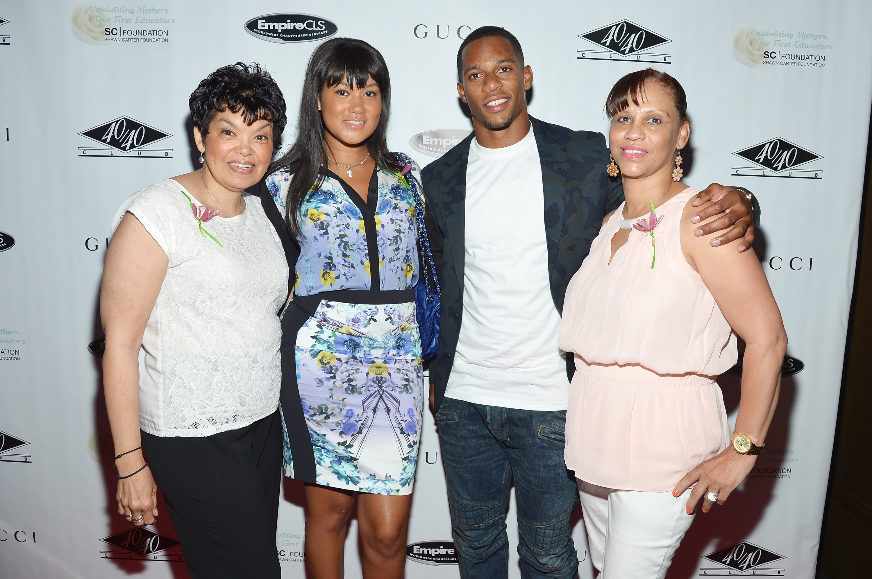 NEW YORK, NY - MAY 11:  (L-R) Karen Watley, Elaina Watley, professional football player Victor Cruz, and Blanca Cruz attend the Shawn Carter Foundation's Mother's Day event "Celebrating Mothers, Our First Educators" at 40 / 40 Club on May 11, 2013 in New York City.  (Photo by Mike Coppola/WireImage)