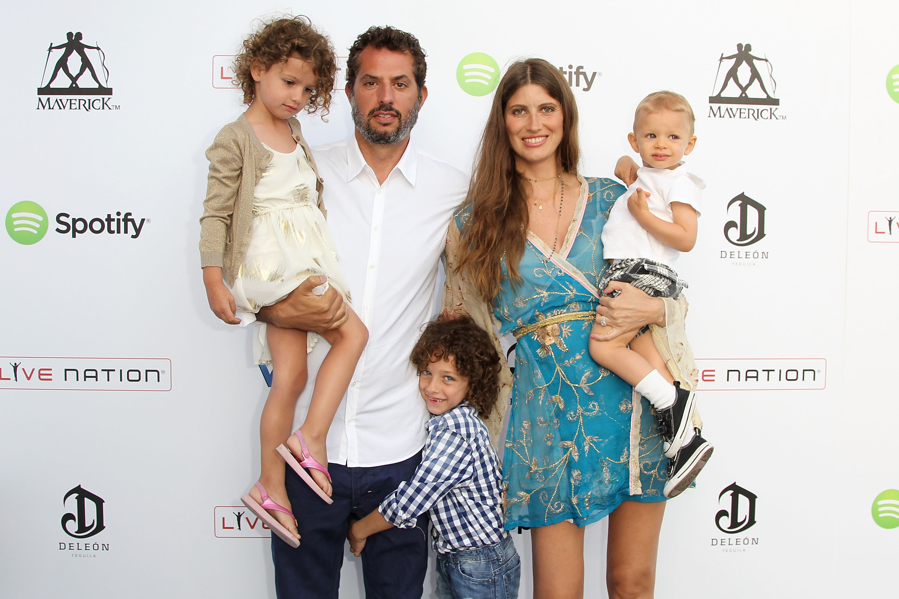 MALIBU, CA - JULY 04:  (L-R) Guy Oseary, Michelle Alves and family attend the DeLeon Tequila Presents Guy Oseary's 4th Of July Bash at Nobu Malibu on July 4, 2013 in Malibu, California.  (Photo by Jonathan Leibson/WireImage)