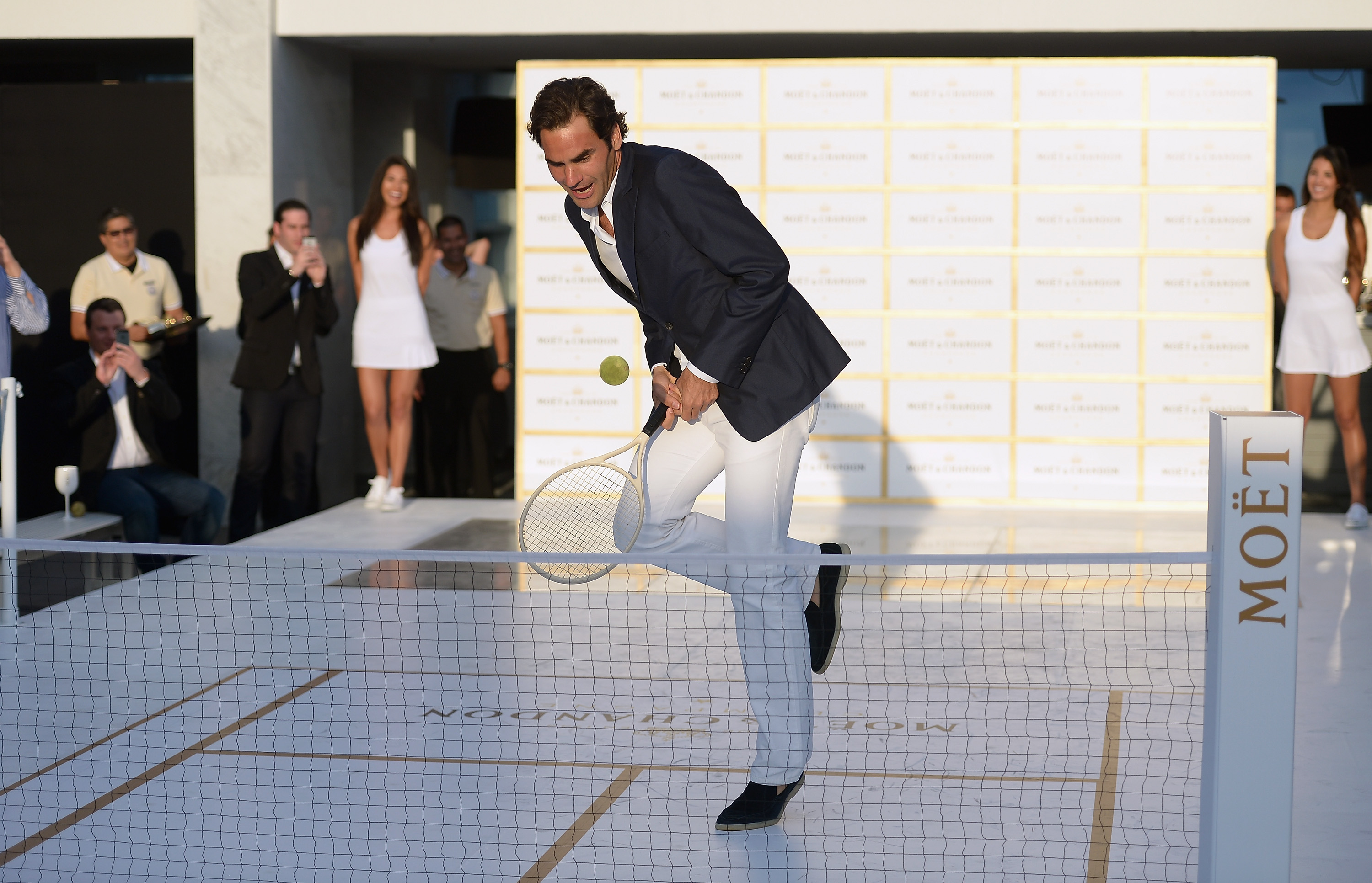 Roger Federer attends the Moet & Chandon "Tiny Tennis" With Roger Federer at Club 50 at Viceroy Miami on March 19, 2014 in Miami, Florida.  (Photo by Gustavo Caballero/Getty Images for Moet & Chandon)
