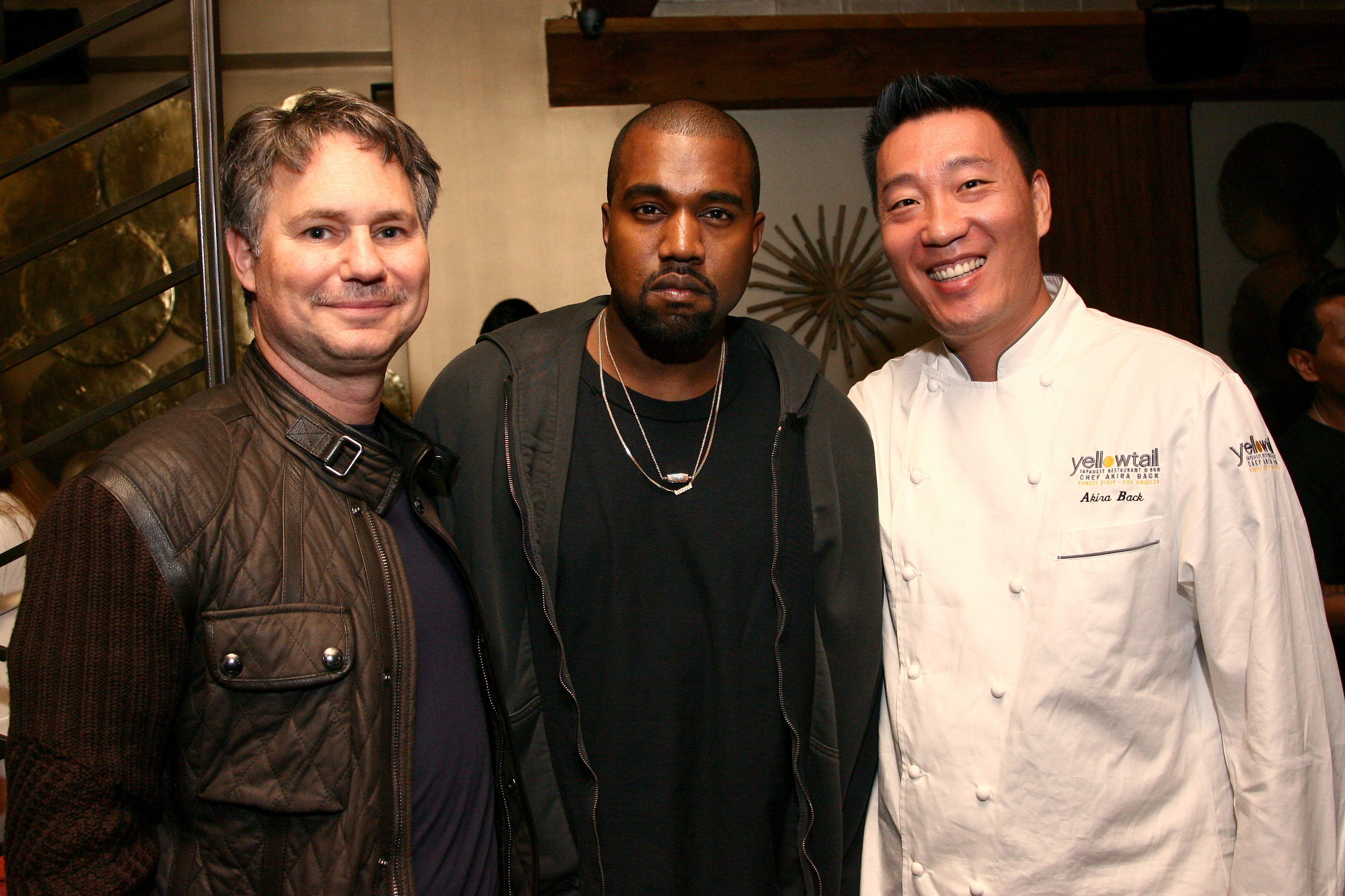 Founder of DuJour Media Jason Binn, rapper Kanye West, and chef Akira Back