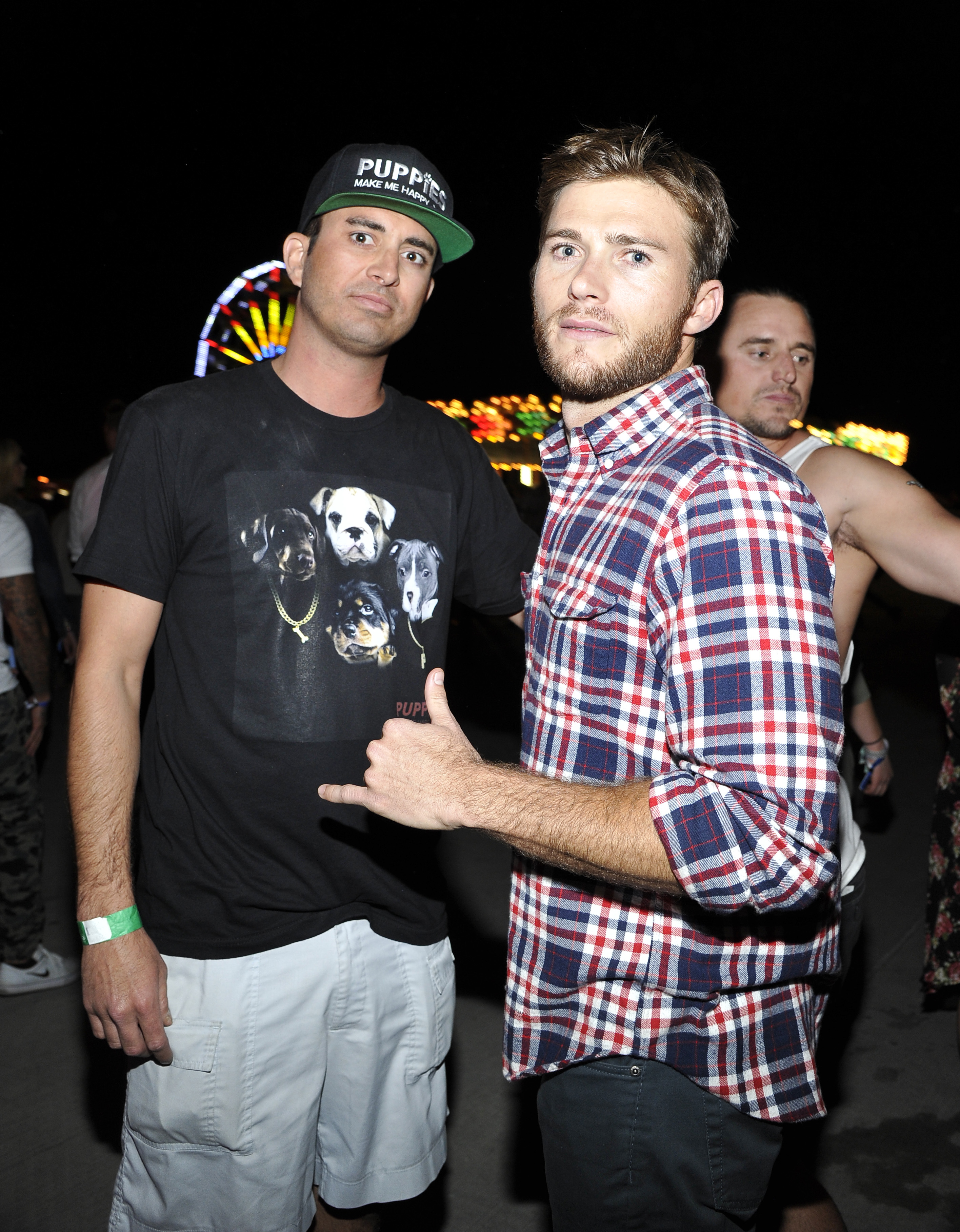 Actor Scott Eastwood (R) and guest attend the Neon Carnival with PacSun, "Dope the Movie and Tequila Don Julio