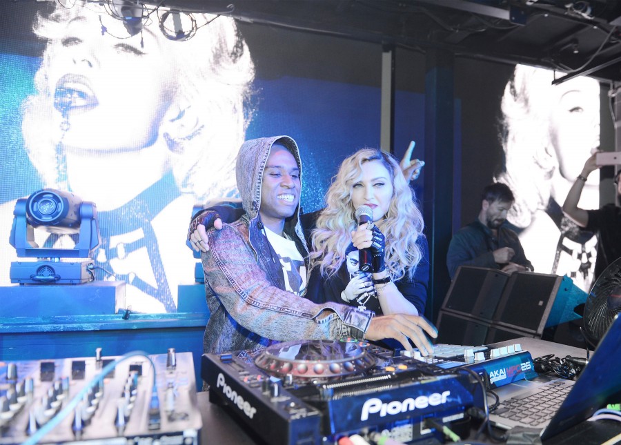 LAS VEGAS, NV - OCTOBER 25: DJ Lunice (L) performs as singer Madonna speaks at Marquee Nightclub at The Cosmopolitan of Las Vegas as Madonna hosts an after party for her Rebel Heart Tour concert stop on October 25, 2015 in Las Vegas, Nevada.  (Photo by Denise Truscello/WireImage) *** Local Caption *** DJ Lunice; Madonna