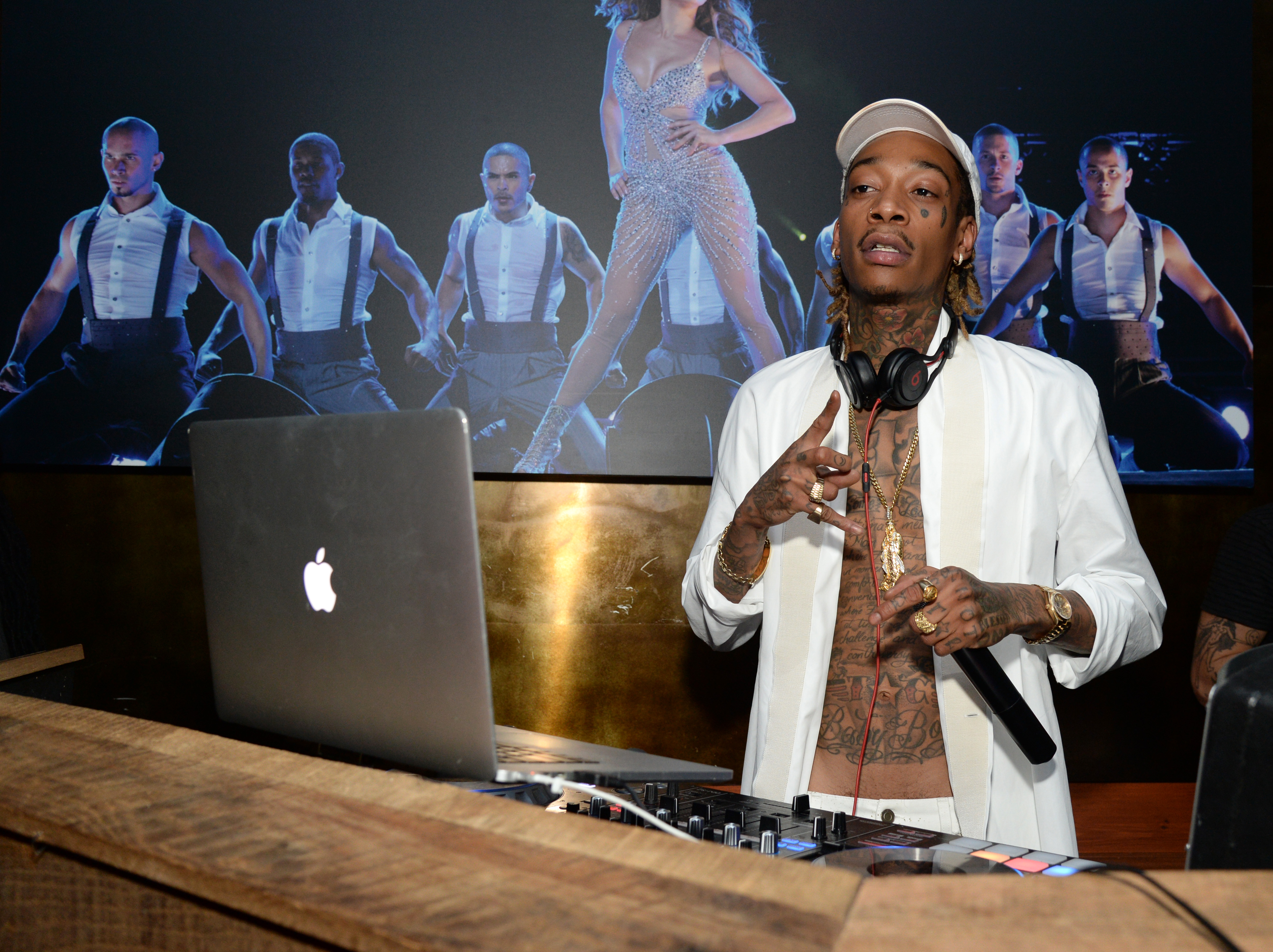 WEST HOLLYWOOD, CA - NOVEMBER 22: Rapper Wiz Khalifa spins at the Moet & Chandon AMA After Party with Jennifer Lopez at HYDE Sunset: Kitchen + Cocktails on November 22, 2015 in West Hollywood, California. (Photo by Michael Kovac/Getty Images for Moet & Chandon)