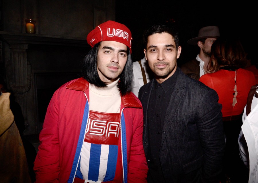 Joe Jonas, left, and Wilmer Valderrama attend the 2015 Just Jared Halloween Party at No Vacancy on Saturday, Oct. 31, 2015, in Hollywood, Calif. (Photo by Dan Steinberg/Invision for Just Jared/AP Images)