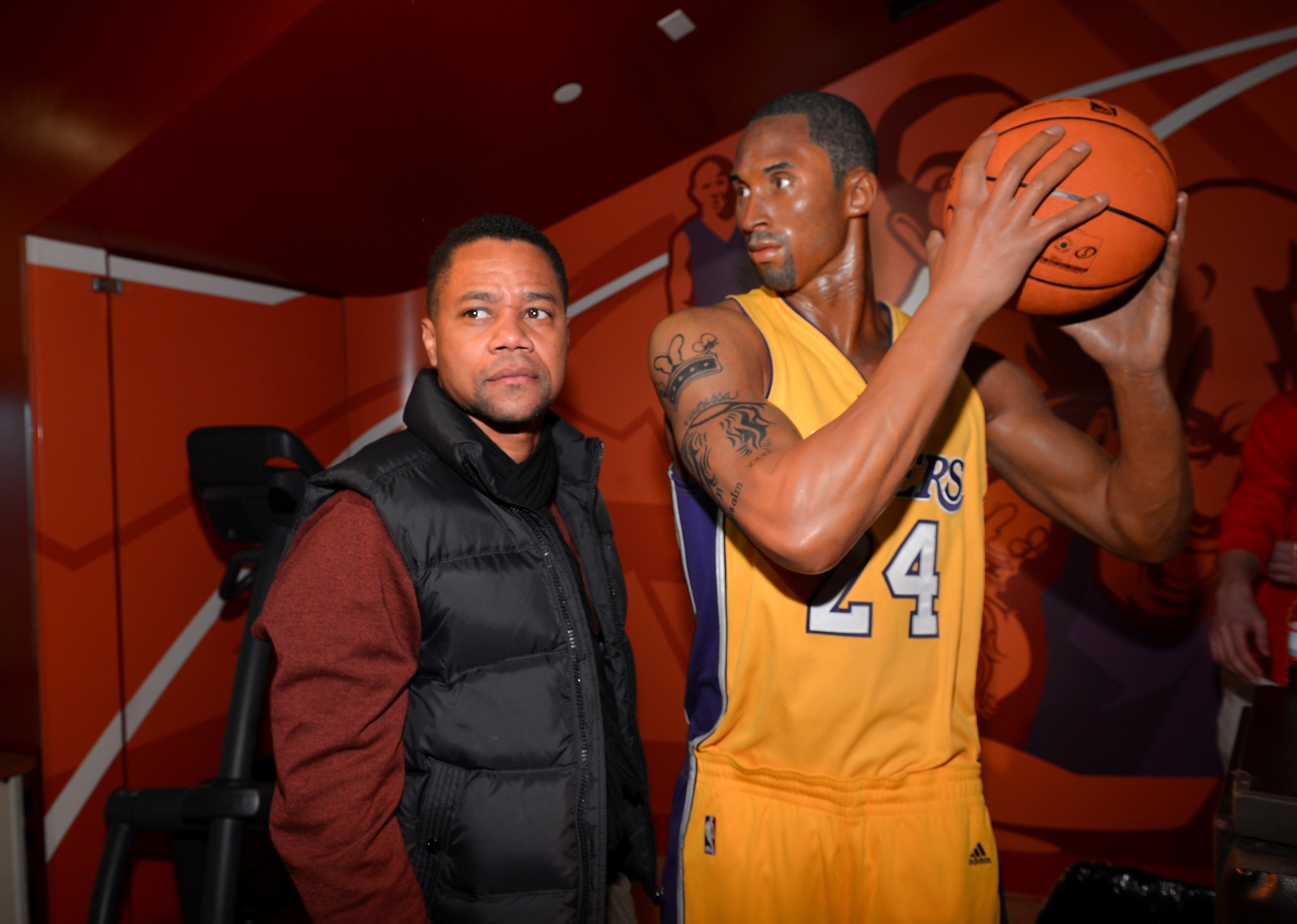 HOLLYWOOD, CA - JANUARY 23:  Actor Cuba Gooding Jr. (L) poses next to a wax figure of NBA player Kobe Bryant as he attends Relativity Media's "Movie 43" Los Angeles Premiere After Party on January 23, 2013 in Hollywood, California.  (Photo by Alberto E. Rodriguez/Getty Images For Relativity Media)
