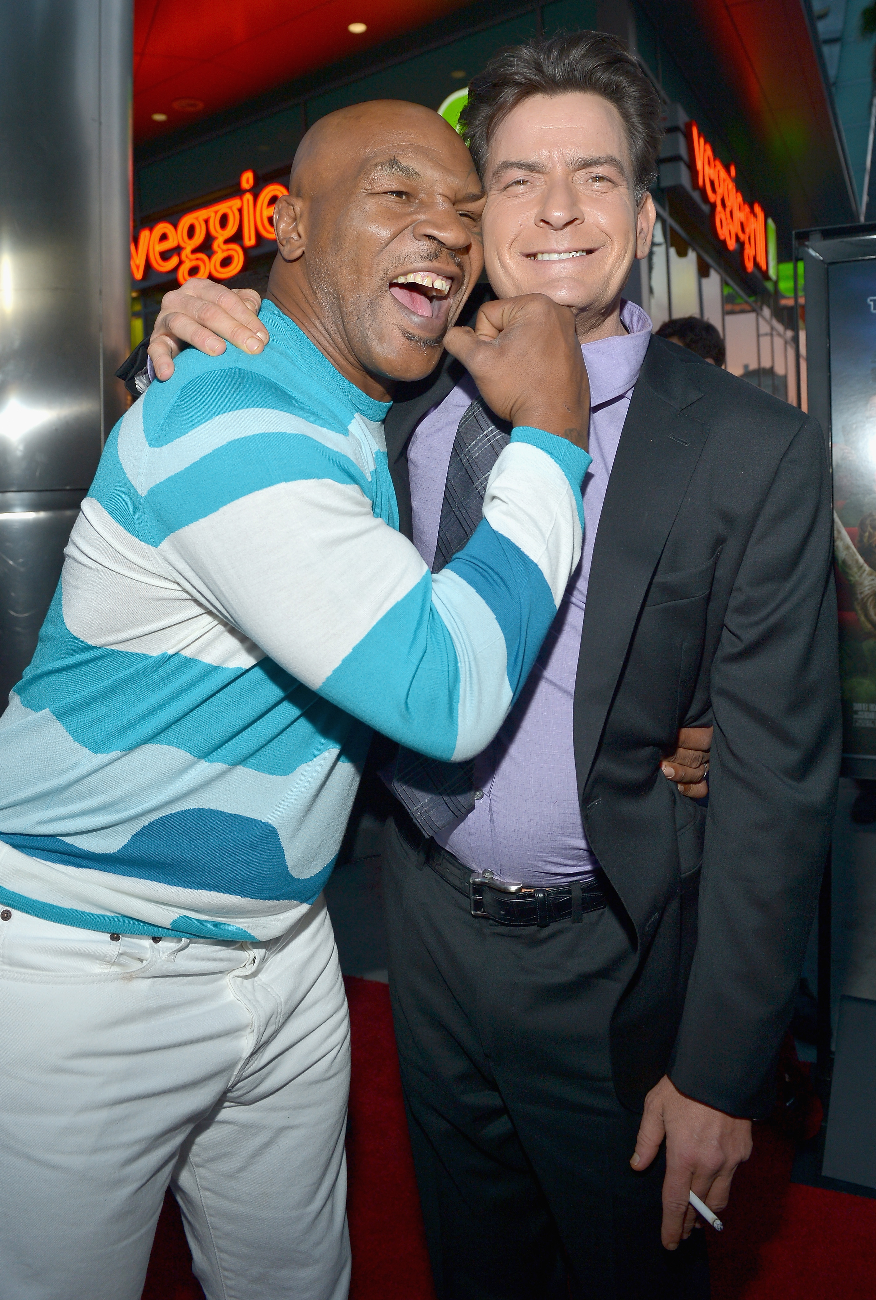 LOS ANGELES, CA - APRIL 11:  Actors Mike Tyson and Charlie Sheen arrive at the premiere of "Scary Movie V" presented by Dimension Films, in partnership with Lexus and Chambord at the Cinerama Dome on April 11, 2013 in Los Angeles, California.  (Photo by Charley Gallay/WireImage)