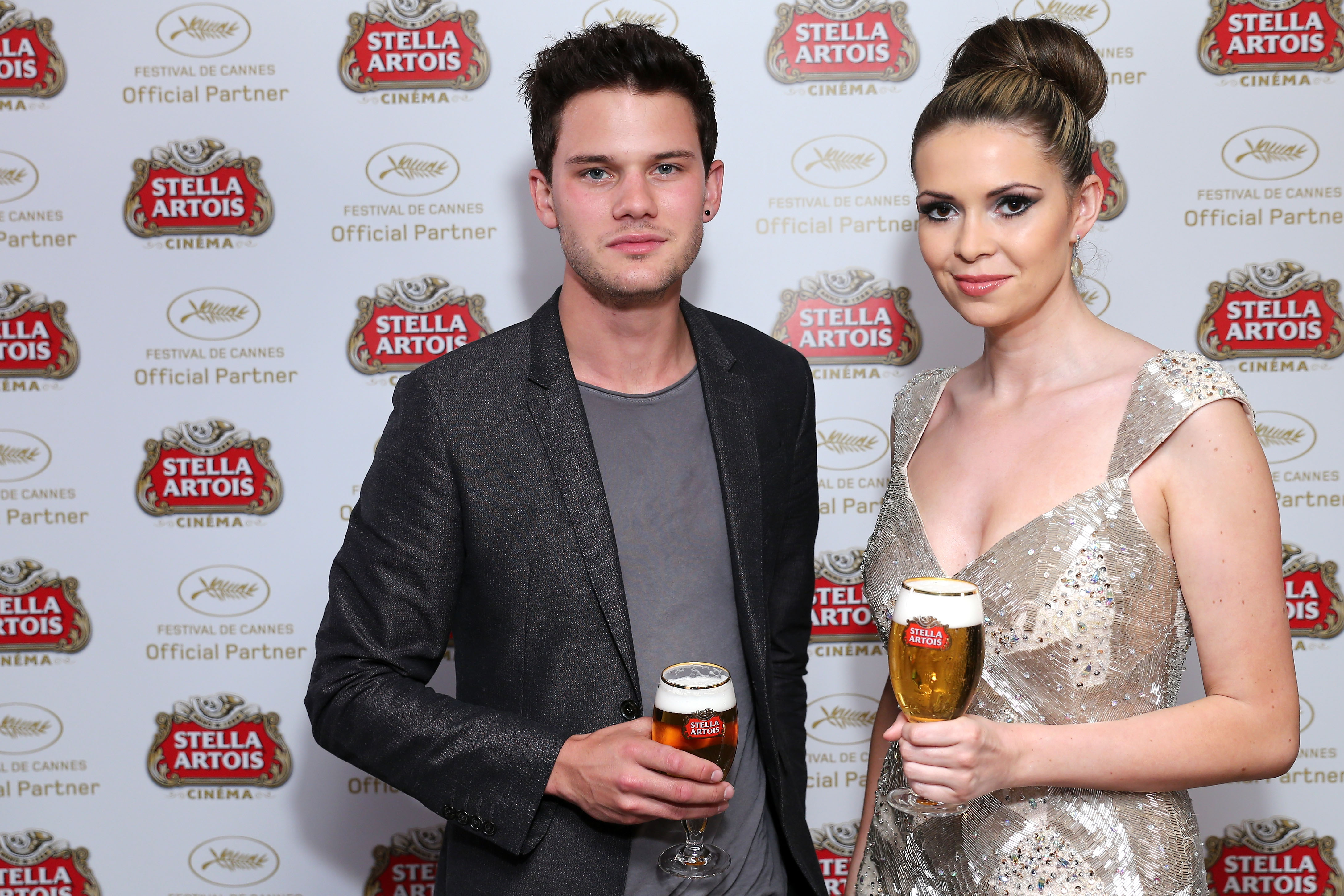 CANNES, FRANCE - MAY 18:  Jeremy Irvine and Carly Steel attends Stella Artois Unveils The Connoisseur Series At The 66th Cannes Film Festival during the 66th Annual Cannes Film Festival on May 18, 2013 in Cannes, France.  (Photo by Neilson Barnard/Getty Images for Stella Artois)