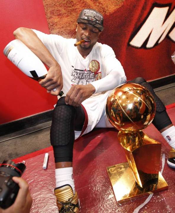 Dwayne Wade icing his Knee with Moet Ice Imperial