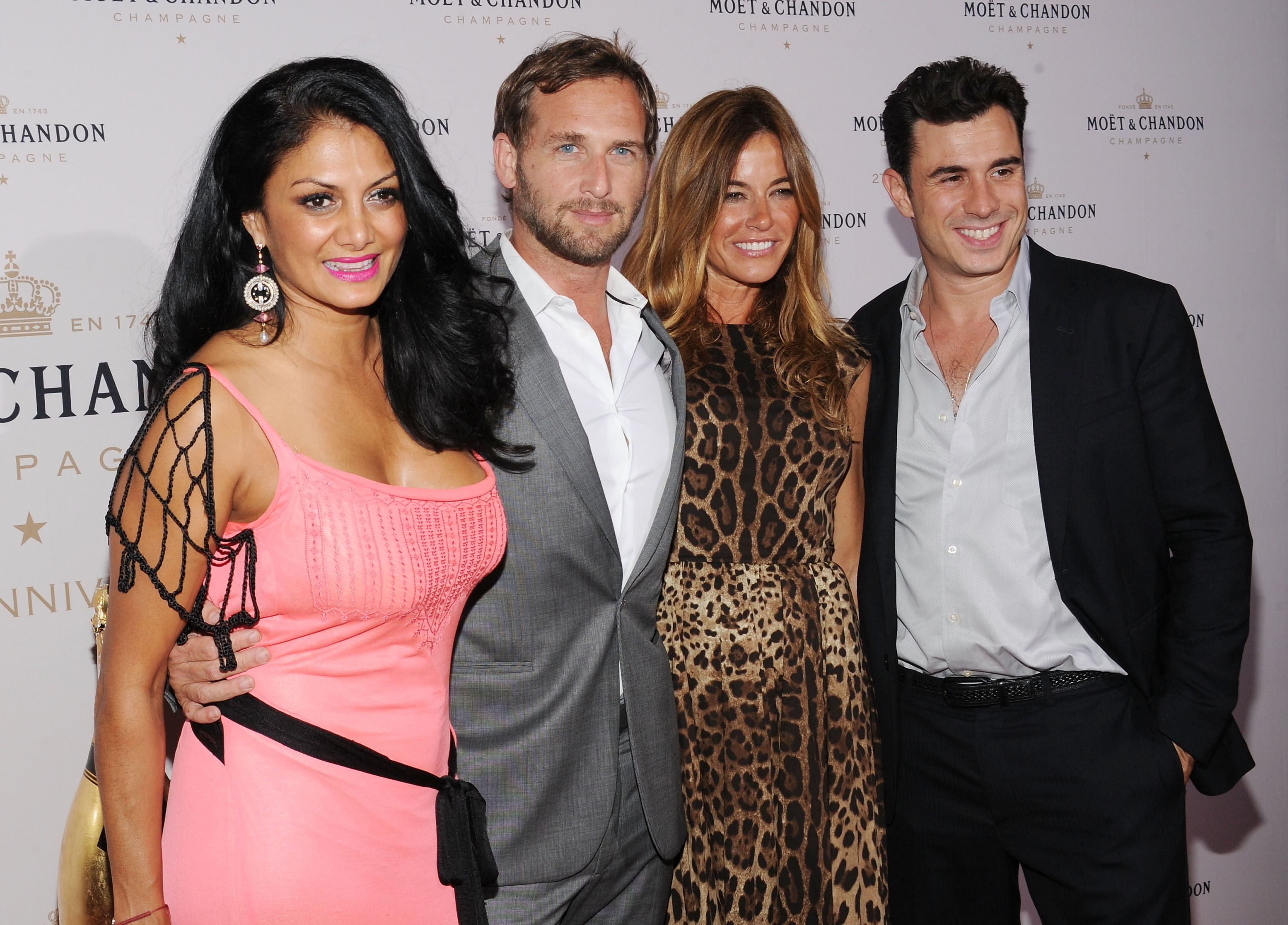NEW YORK, NY - AUGUST 20:  (L-R) Donna D'Cruz, Josh Lucas, Kelly Bensimon, and Troy Curtis attend Moet & Chandon Celebrates Its 270th Anniversary With New Global Brand Ambassador, International Tennis Champion, Roger Federer at Chelsea Piers Sports Center on August 20, 2013 in New York City.  (Photo by Bryan Bedder/Getty Images for Moet & Chandon)