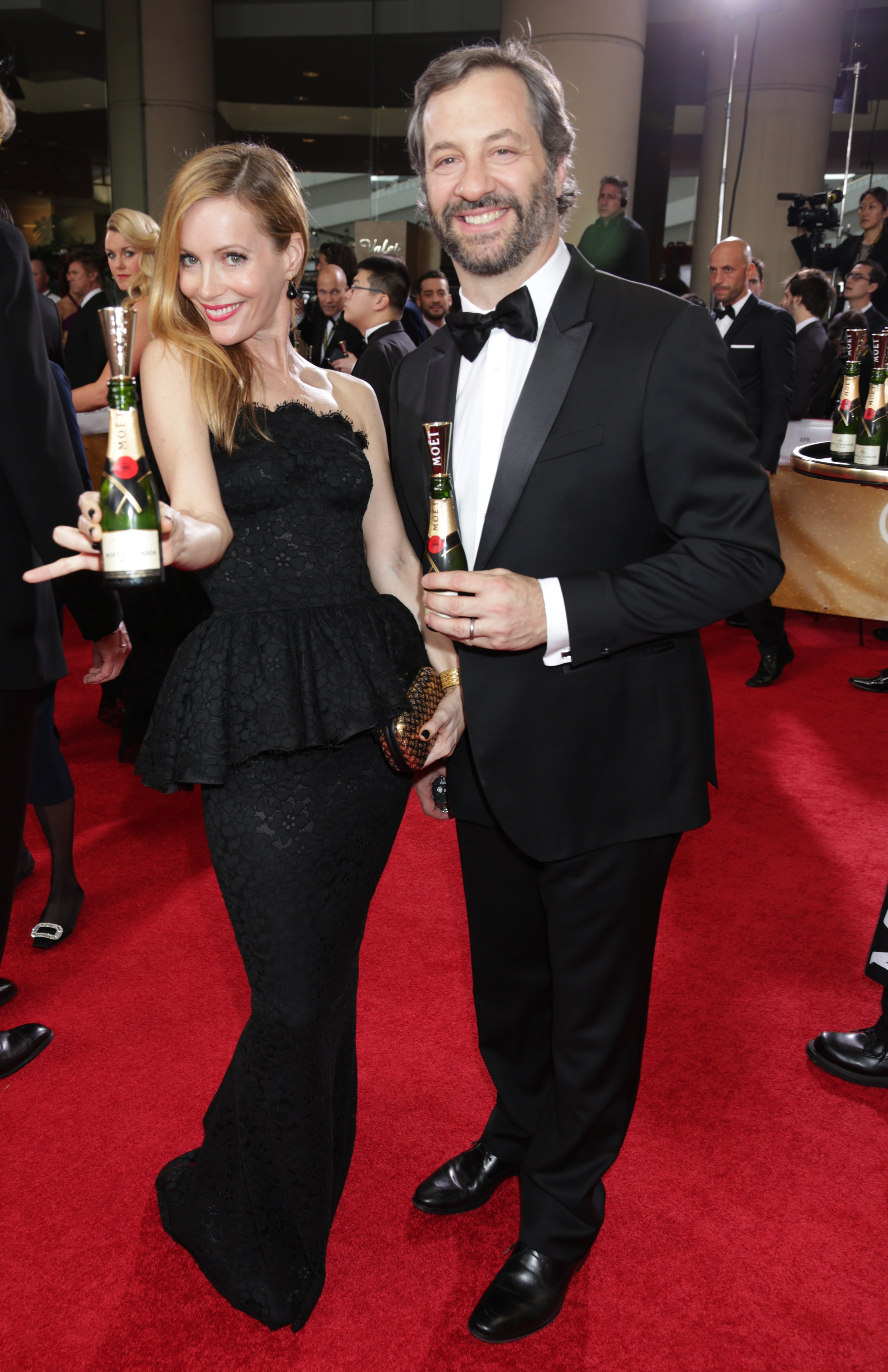 Leslie Mann and Judd Apatow with Moët & Chandon at the 71th Annual Golden Globe Awards Red Carpet at the Beverly Hilton in Beverly Hills on Sunday, January 12, 2014(Photo: Alex J. Berliner / ABImages)
