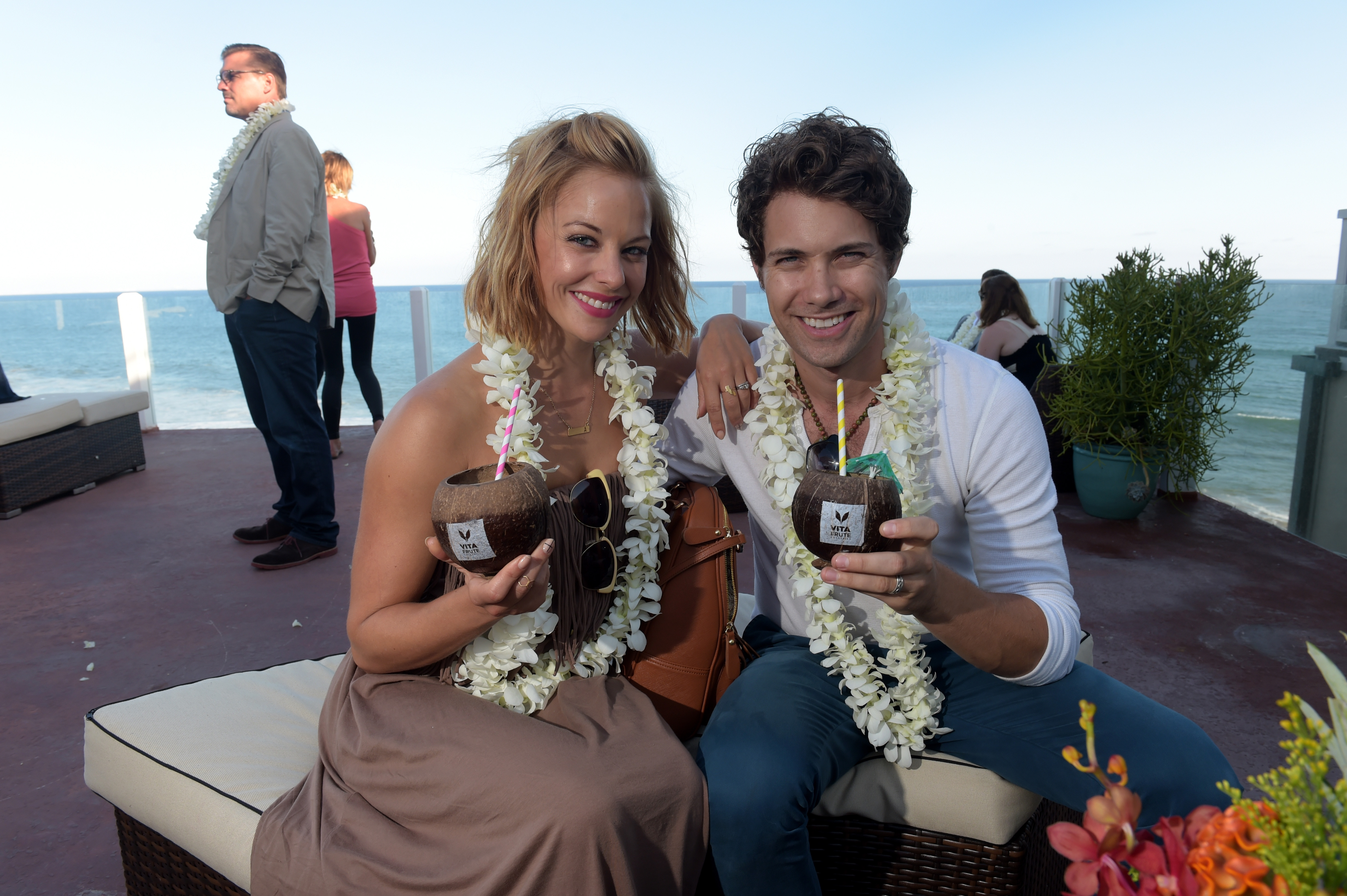 Actors Amy Paffrath (L) and Drew Seeley attend the VitaFrute Cocktails by VEEV Coconut Colada Launch at Beach Haus Malibu on August 13, 2014 in Malibu, California