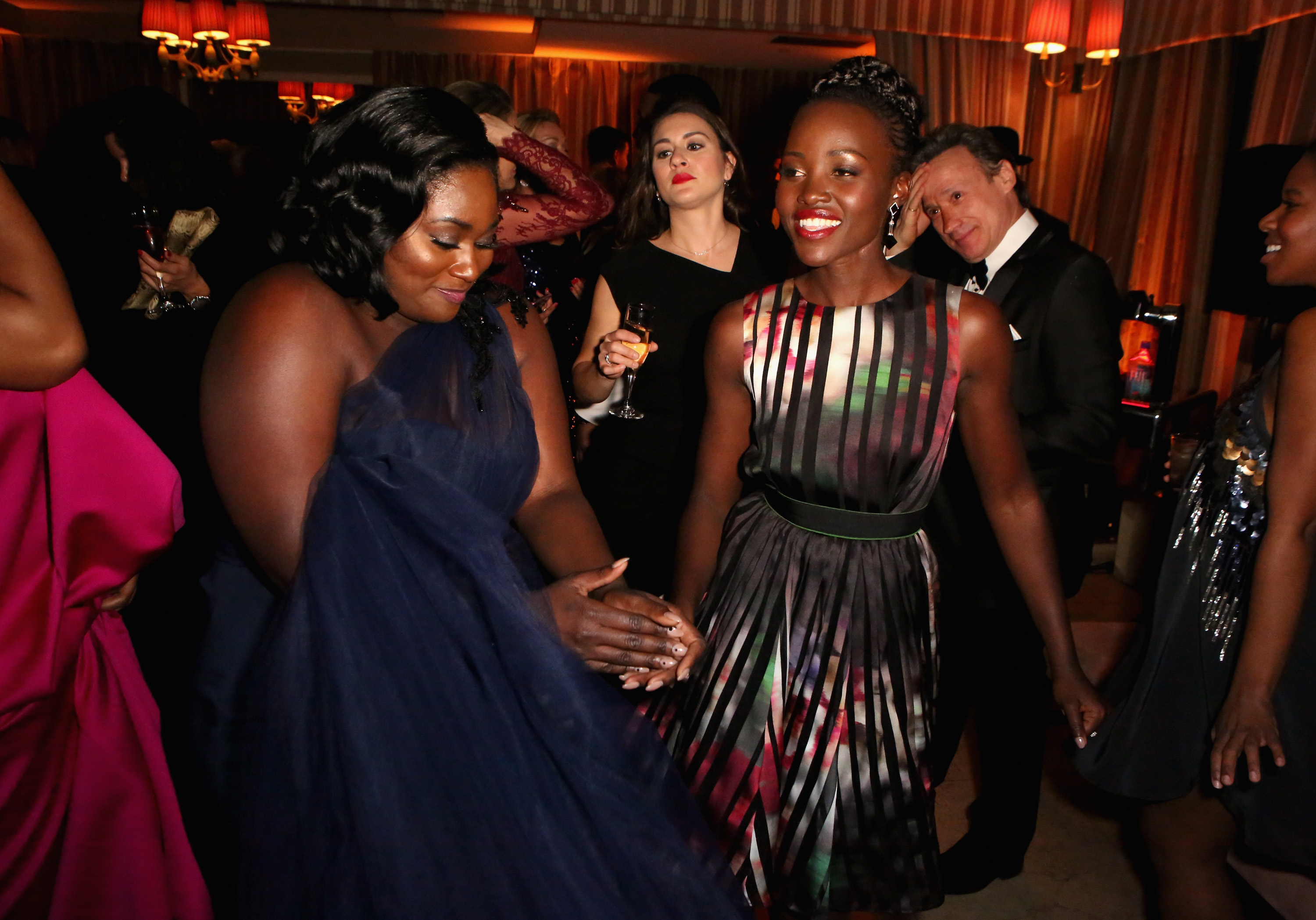 Actresses Danielle Brooks and Lupita Nyong'o (R) attend The Weinstein Company & Netflix's 2015 SAG After Party