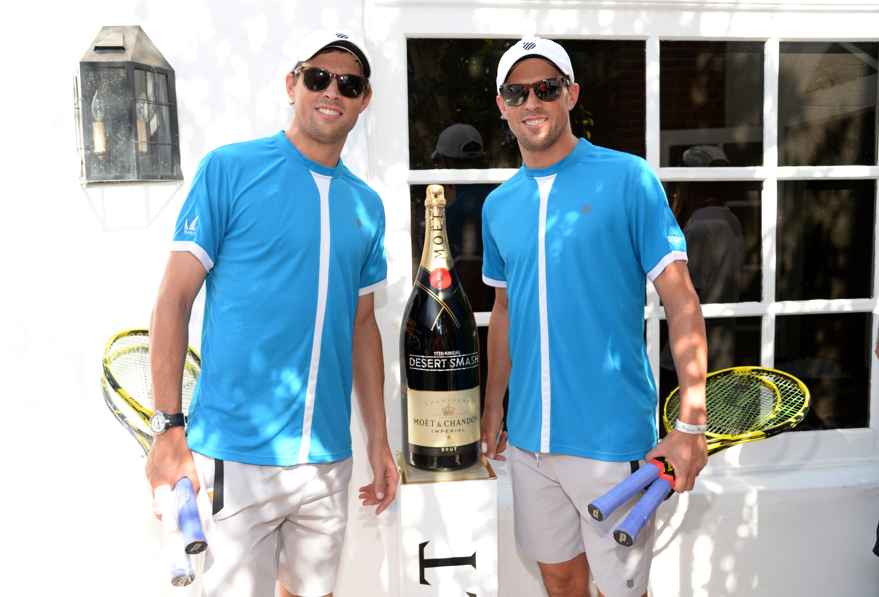 Tennis players Bob and Mike Bryan celebrate with Moet & Chandon at the 11th annual Desert Smash at La Quinta Resort and Club
