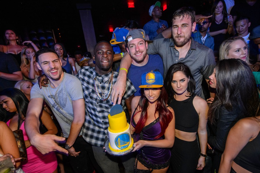 Golden State Warriors players, Klay Thompson, Draymond Green, David Lee, and Andrew Bogut, celebrate their NBA Finals victory at Marquee Nightclub in Las Vegas, NV, on June 19, 2015 (Photo by Al Powers/Powers Imagery/Invision/AP)
