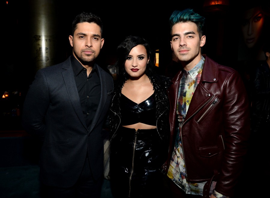 WEST HOLLYWOOD, CA - NOVEMBER 22: Wilmer Valderrama, Demi Lovato and Joe Jonas attend the Moet & Chandon AMA After Party with Jennifer Lopez at HYDE Sunset: Kitchen + Cocktails on November 22, 2015 in West Hollywood, California. (Photo by Michael Kovac/Getty Images for Moet & Chandon)