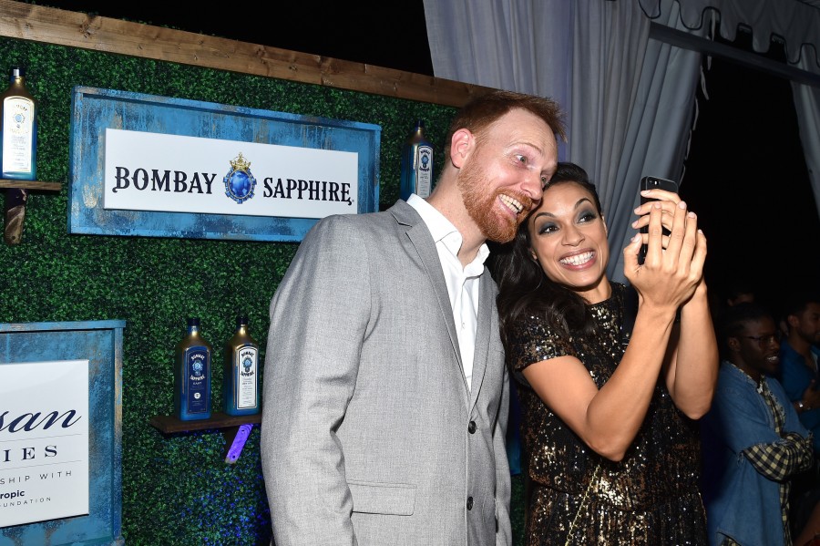 MIAMI BEACH, FL - DECEMBER 04: The National Winner of the 6th annual Bombay Sapphire aritsian series finale Aron Belka (L) and Rosario Dawson attend The 6th Annual Bombay Sapphire Artisan Series Grand Finale Cohosted By Russell Simmons And Rosario Dawson During Art Basel at Nautilus Hotel on December 4, 2015 in Miami Beach, Florida. (Photo by Mike Coppola/Getty Images for Bombay)