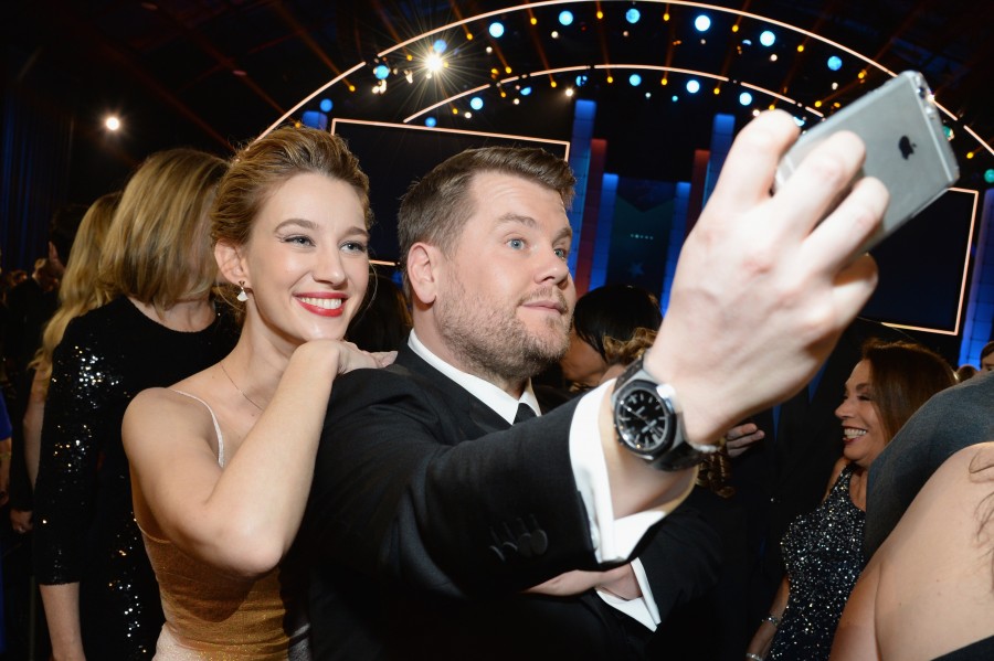 SANTA MONICA, CA - JANUARY 17: Actress Yael Grobglas (L) and TV personality James Corden pose for a selfie photo at the 21st Annual Critics' Choice Awards at Barker Hangar on January 17, 2016 in Santa Monica, California. (Photo by Michael Kovac/Getty Images for Moet & Chandon)