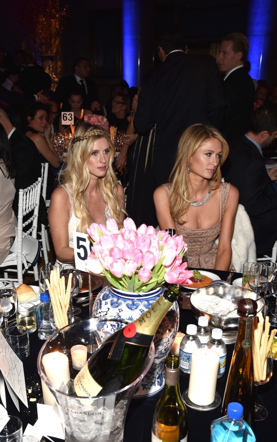 NEW YORK, NY - FEBRUARY 10: Socialites Nicky Hilton and Paris Hilton are seen during Moet & Chandon Toasts to the amfAR Gala at Cipriani Wall Street on February 10, 2016 in New York City. (Photo by Bryan Bedder/Getty Images for Moet & Chandon)