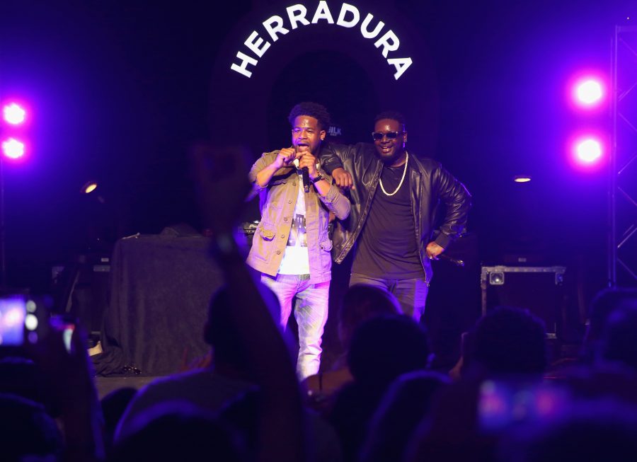 "LOS ANGELES, CA - APRIL 26: Courtney James (L) and T-Pain perform onstage during Casa Herradura Visits Los Angeles on April 26, 2016 in Los Angeles, California. (Photo by Joe Scarnici/Getty Images for Tequila Herradura)"