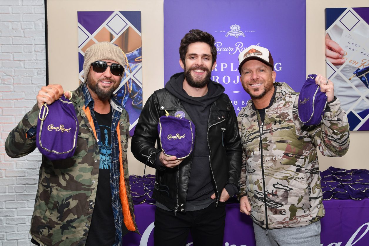 NASHVILLE, TN - NOVEMBER 13:  Thomas Rhett and LOCASH team up with the Crown Royal Purple Bag Project to assemble care packages for servicemen and women overseas on November 13, 2018 in Nashville, Tennessee.  (Photo by Erika Goldring/Getty Images for Crown Royal)