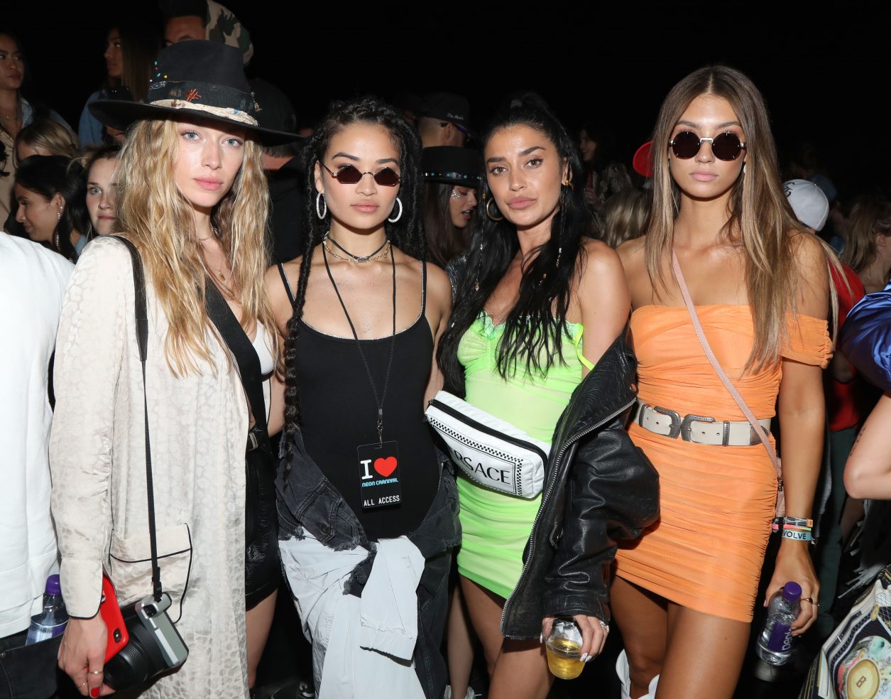 THERMAL, CALIFORNIA - APRIL 13: Shanina Shaik (2nd from (L), Nicole Williams (2nd from R) and guests attend the Levi's Brand Presents Neon Carnival with Bondi Sands and POKÉMON: Detective Pikachu on April 13, 2019 in Thermal, California. (Photo by Jerritt Clark/Getty Images for Neon Carnival)