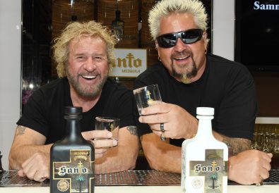 LAS VEGAS, NEVADA - APRIL 04:  Rock & Roll Hall of Fame inductee Sammy Hagar (L) and Emmy Award-winning chef and television personality Guy Fieri pose during the announcement of their partnership with Los Santo and Santo Puro Mezquila, in addition to the launch of Santo Fino Tequila at Southern Glazer's Wine & Spirits on April 4, 2019 in Las Vegas, Nevada.  (Photo by Ethan Miller/Getty Images for Los Santos: Santo Puro Mezquila)