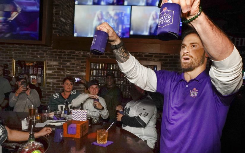 Chris Long hangs out with football fans during a Crown Royal party at a local Philadelphia bar, Sunday, Oct. 20, 2019. (Photo by Jack Dempsey for Crown Royal)